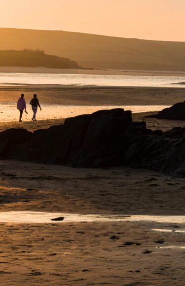 Rock-Sunset-AdobeStock_260529642-PORTRAIT-scaled
