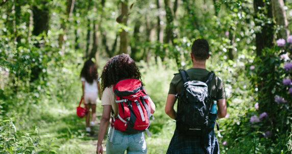 Family walking in the woods