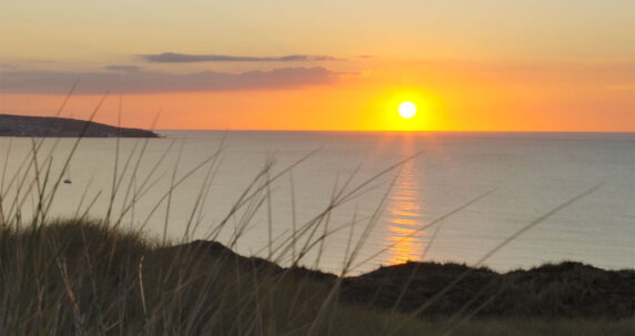 Sun setting over the sea on a weekend break