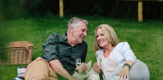 Couple enjoying champagne on a staycation