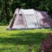 A tent on grass.