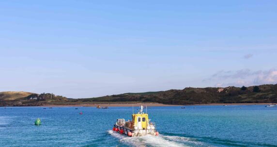 A small boat in the sea.