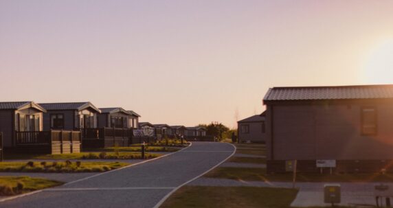 View of lodges while sun is setting.