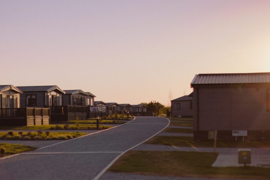 View of lodges while sun is setting.