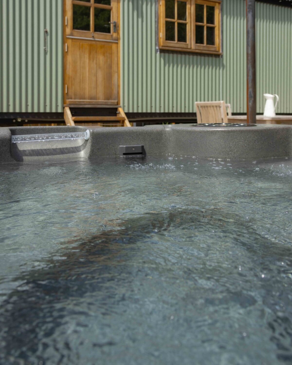 View of a Shepard's hut from a hot tub.