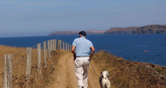 Man walking his dog.