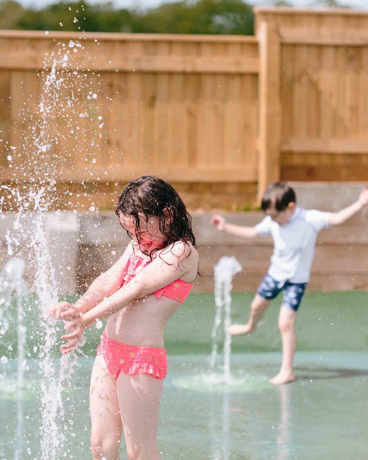 Children playing in the water.