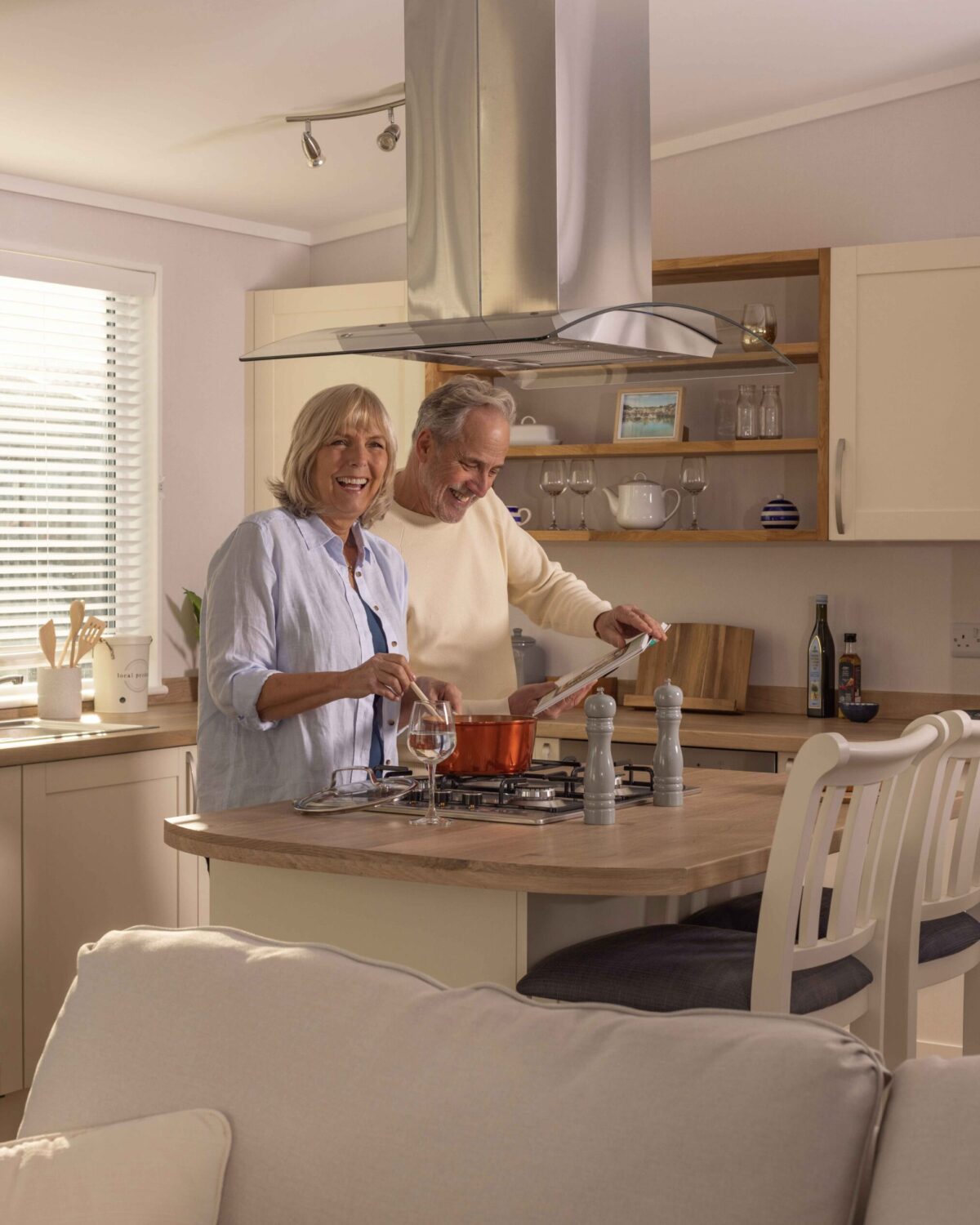 A couple cooking together.