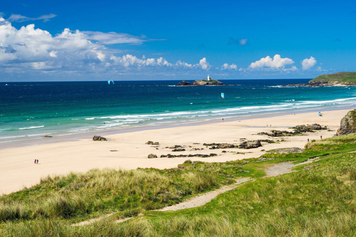 The beautiful golden sandy beach at Gwithian with Godrevy in the distance